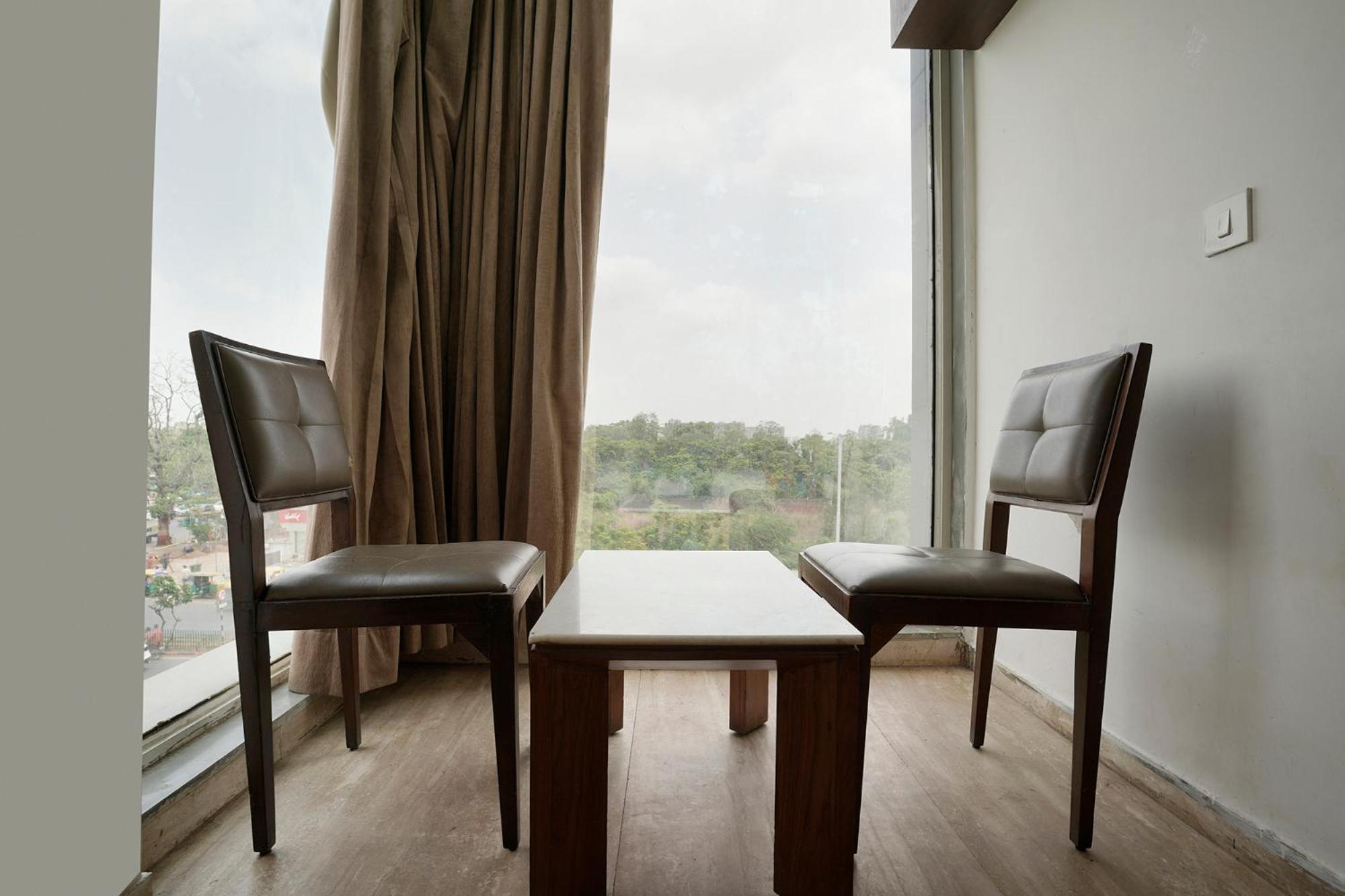 Fabhotel Kyra - Near Airport Road أحمد أباد المظهر الخارجي الصورة